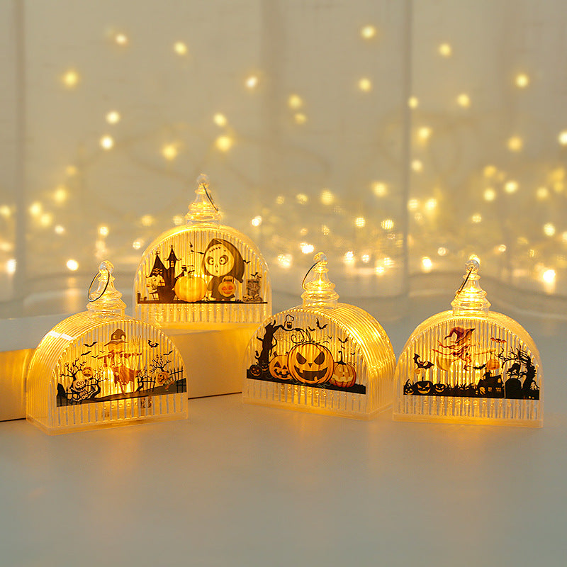 Lanterne LED Halloween accese su sfondo con luci calde